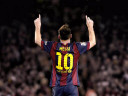 Lionel Messi celebrates after scoring for Barcelona