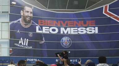 A poster reading 'Welcome Leo Messi' put up outside PSG's stadium