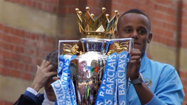 Kompany at the open top bus parade after winning the 2011/12 Premier League
